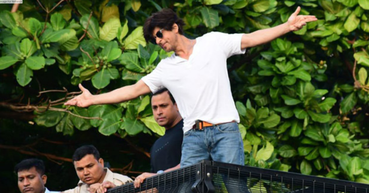 On 57th birthday, Shah Rukh Khan greets fans with his 'signature pose'